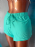 Short bsico verde gua